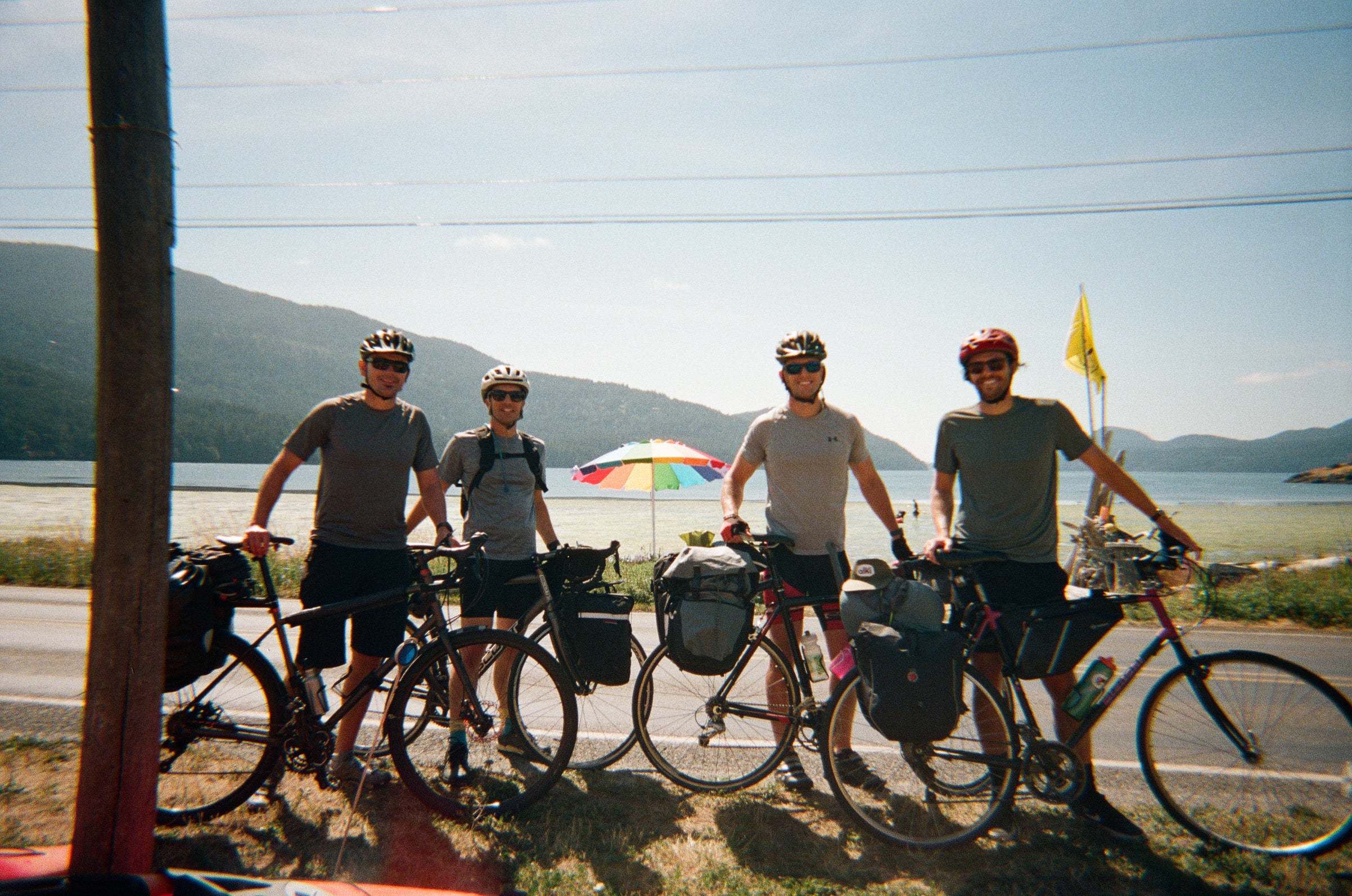 4 friends posing with their bikes on Orcas Island
