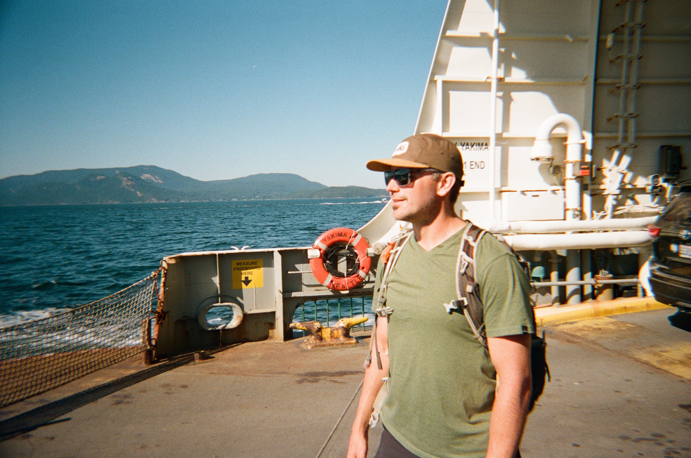 Nick wearing his Alki Supply hat on the ferry back to Anacortes