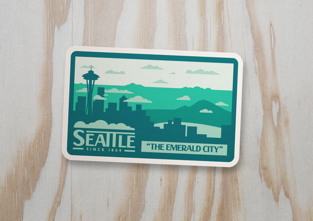 Seattle skyline sticker in shades of green including tagline "The Emerald City"