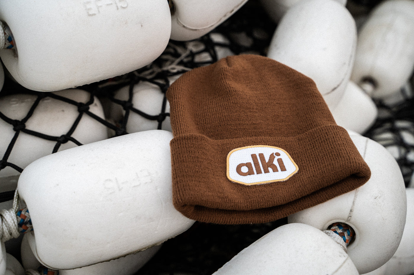 brown beanie with alki patch